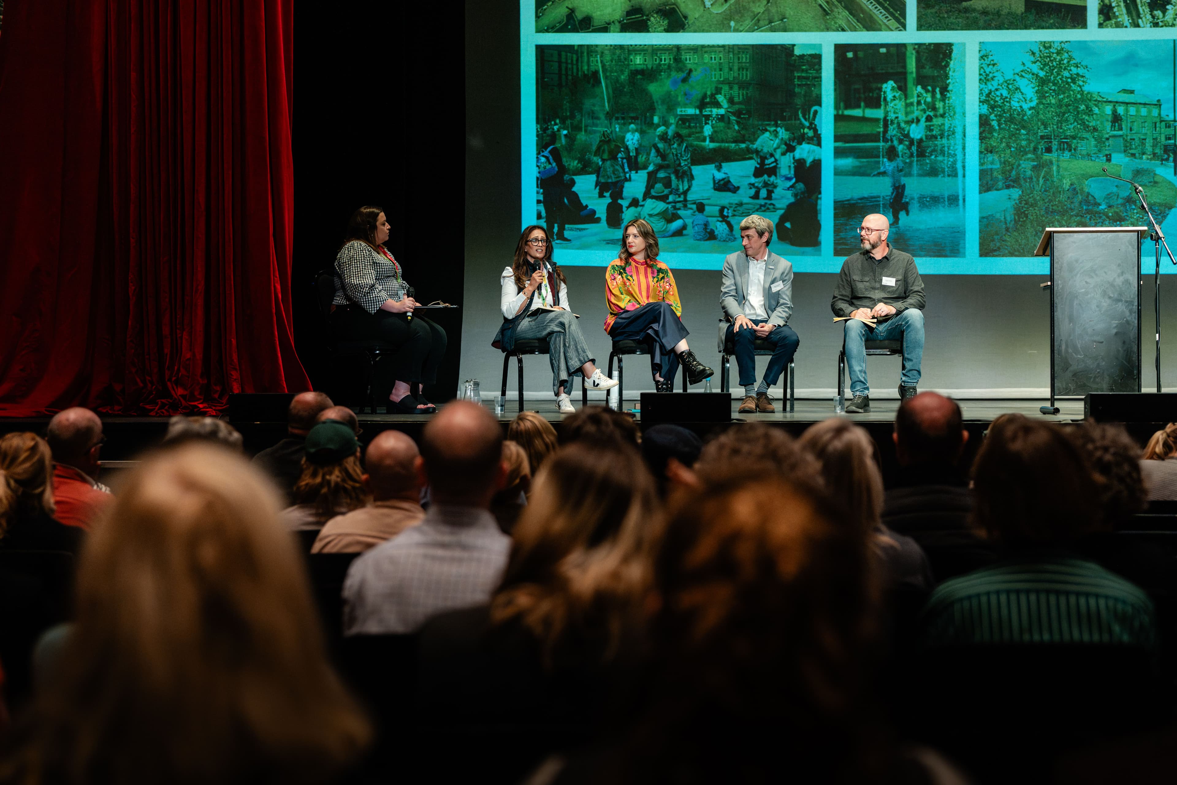 A group of people taking part in a panel discussion.